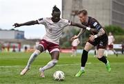 6 May 2024; Jeanno Esua of Galway United in action against Danny Grant of Bohemians during the SSE Airtricity Men's Premier Division match between Bohemians and Galway United at Dalymount Park in Dublin. Photo by Ben McShane/Sportsfile