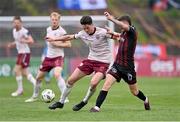 6 May 2024; Adam McDonnell of Bohemians in action against Patrick Hickey of Galway United during the SSE Airtricity Men's Premier Division match between Bohemians and Galway United at Dalymount Park in Dublin. Photo by Ben McShane/Sportsfile