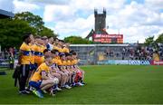 5 May 2024; The Clare team sit for a team photograph before the Munster GAA Football Senior Championship final match between Kerry and Clare at Cusack Park in Ennis, Clare. Photo by Brendan Moran/Sportsfile