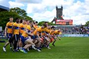 5 May 2024; The Clare team disperse after sitting for a team photograph before the Munster GAA Football Senior Championship final match between Kerry and Clare at Cusack Park in Ennis, Clare. Photo by Brendan Moran/Sportsfile