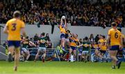 5 May 2024; Darragh Bohannon of Clare catches a kickout ahead of Diarmuid O'Connor of Kerry during the Munster GAA Football Senior Championship final match between Kerry and Clare at Cusack Park in Ennis, Clare. Photo by Brendan Moran/Sportsfile