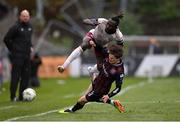 6 May 2024; Jeannot Esua of Galway United is tackled by Paddy Kirk of Bohemians during the SSE Airtricity Men's Premier Division match between Bohemians and Galway United at Dalymount Park in Dublin. Photo by Ben McShane/Sportsfile