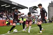 6 May 2024; Leo Gaxha of Galway United in action against Declan McDaid, left, and Paddy Kirk of Bohemians during the SSE Airtricity Men's Premier Division match between Bohemians and Galway United at Dalymount Park in Dublin. Photo by Ben McShane/Sportsfile