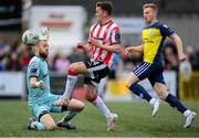 6 May 2024; Ben Doherty of Derry City in action against Shelbourne goalkeeper Conor Kearns during the SSE Airtricity Men's Premier Division match between Derry City and Shelbourne at The Ryan McBride Brandywell Stadium in Derry. Photo by Stephen McCarthy/Sportsfile