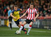 6 May 2024; Daniel Kelly of Derry City in action against JJ Lunney of Shelbourne during the SSE Airtricity Men's Premier Division match between Derry City and Shelbourne at The Ryan McBride Brandywell Stadium in Derry. Photo by Stephen McCarthy/Sportsfile