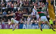 5 May 2024; Cathal Sweeney of Galway in action against Sam Callinan of Mayo during the Connacht GAA Football Senior Championship final match between Galway and Mayo at Pearse Stadium in Galway. Photo by Daire Brennan/Sportsfile