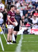5 May 2024; Linesman Brendan Cawley alongside Shane Walsh of Galway during the Connacht GAA Football Senior Championship final match between Galway and Mayo at Pearse Stadium in Galway. Photo by Piaras Ó Mídheach/Sportsfile