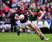 5 May 2024; John Maher of Galway in action against Eoghan McLaughlin of Mayo during the Connacht GAA Football Senior Championship final match between Galway and Mayo at Pearse Stadium in Galway. Photo by Piaras Ó Mídheach/Sportsfile