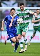 6 May 2024; Aaron Greene of Shamrock Rovers in action against Dean McMenamy of Waterford during the SSE Airtricity Men's Premier Division match between Shamrock Rovers and Waterford at Tallaght Stadium in Dublin. Photo by Piaras Ó Mídheach/Sportsfile