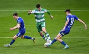 6 May 2024; Neil Farrugia of Shamrock Rovers in action against Darragh Leahy, left, and Harvey Macadam of Waterford during the SSE Airtricity Men's Premier Division match between Shamrock Rovers and Waterford at Tallaght Stadium in Dublin. Photo by Piaras Ó Mídheach/Sportsfile