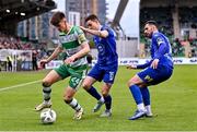 6 May 2024; Johnny Kenny of Shamrock Rovers in action against Waterford players Darragh Leahy and Harvey Macadam during the SSE Airtricity Men's Premier Division match between Shamrock Rovers and Waterford at Tallaght Stadium in Dublin. Photo by Piaras Ó Mídheach/Sportsfile