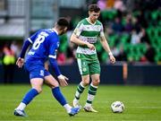 6 May 2024; Markus Poom of Shamrock Rovers in action against Robbie McCourt of Waterford during the SSE Airtricity Men's Premier Division match between Shamrock Rovers and Waterford at Tallaght Stadium in Dublin. Photo by Piaras Ó Mídheach/Sportsfile