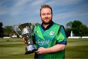9 May 2024; Ireland captain Paul Stirling with the trophy during a captains photocall at Castle Avenue Cricket Ground in Dublin, ahead of the Men's T20 International Series between Ireland and Pakistan. Photo by Seb Daly/Sportsfile