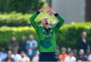 10 May 2024; Ben White of Ireland reacts during match one of the Floki Men's T20 International Series between Ireland and Pakistan at Castle Avenue Cricket Ground in Dublin. Photo by Seb Daly/Sportsfile