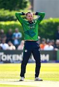 10 May 2024; Ben White of Ireland reacts during match one of the Floki Men's T20 International Series between Ireland and Pakistan at Castle Avenue Cricket Ground in Dublin. Photo by Seb Daly/Sportsfile