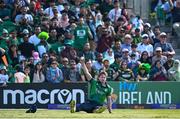 10 May 2024; Barry McCarthy of Ireland celebrates after taking the wicket of Pakistan's Fakhar Zaman during match one of the Floki Men's T20 International Series between Ireland and Pakistan at Castle Avenue Cricket Ground in Dublin. Photo by Seb Daly/Sportsfile