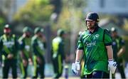 10 May 2024; Paul Stirling of Ireland departs asfter being caught by Pakistan's Babar Azam during match one of the Floki Men's T20 International Series between Ireland and Pakistan at Castle Avenue Cricket Ground in Dublin. Photo by Seb Daly/Sportsfile