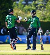10 May 2024; Ireland batters Andrew Balbirnie, right, and Harry Tector during match one of the Floki Men's T20 International Series between Ireland and Pakistan at Castle Avenue Cricket Ground in Dublin. Photo by Seb Daly/Sportsfile
