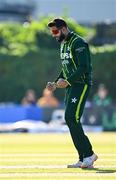 10 May 2024; Imad Wasim of Pakistan celebrates after taking the wicket of Ireland's Harry Tector during match one of the Floki Men's T20 International Series between Ireland and Pakistan at Castle Avenue Cricket Ground in Dublin. Photo by Seb Daly/Sportsfile