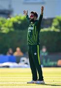 10 May 2024; Imad Wasim of Pakistan celebrates after taking the wicket of Ireland's Harry Tector during match one of the Floki Men's T20 International Series between Ireland and Pakistan at Castle Avenue Cricket Ground in Dublin. Photo by Seb Daly/Sportsfile