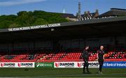 10 May 2024; Derry City manager Ruaidhrí Higgins, left, and assistant manager Paul Hegarty before the SSE Airtricity Men's Premier Division match between Derry City and Bohemians at The Ryan McBride Brandywell Stadium in Derry. Photo by Ramsey Cardy/Sportsfile