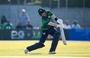 10 May 2024; George Dockrell of Ireland plays a shot, and is caught by Pakistan's Fakhar Zaman, during match one of the Floki Men's T20 International Series between Ireland and Pakistan at Castle Avenue Cricket Ground in Dublin. Photo by Seb Daly/Sportsfile