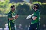 10 May 2024; Abbas Afridi of Pakistan celebrates after taking the wicket of Ireland's George Dockrell, right, during match one of the Floki Men's T20 International Series between Ireland and Pakistan at Castle Avenue Cricket Ground in Dublin. Photo by Seb Daly/Sportsfile