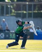 10 May 2024; George Dockrell of Ireland plays a shot, and is caught by Pakistan's Fakhar Zaman, during match one of the Floki Men's T20 International Series between Ireland and Pakistan at Castle Avenue Cricket Ground in Dublin. Photo by Seb Daly/Sportsfile