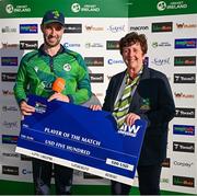 10 May 2024; Andrew Balbirnie of Ireland is presented with the Player of the Match award by Cricket Ireland president Stella Downes after match one of the Floki Men's T20 International Series between Ireland and Pakistan at Castle Avenue Cricket Ground in Dublin. Photo by Seb Daly/Sportsfile