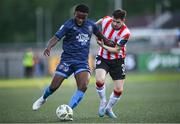 10 May 2024; James Akintunde of Bohemians in action against Ciarán Coll of Derry City during the SSE Airtricity Men's Premier Division match between Derry City and Bohemians at The Ryan McBride Brandywell Stadium in Derry. Photo by Ramsey Cardy/Sportsfile