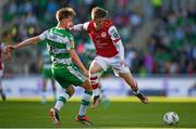 10 May 2024; Chris Forrester of St Patrick's Athletic is tackled by Daniel Cleary of Shamrock Rovers during the SSE Airtricity Men's Premier Division match between Shamrock Rovers and St Patrick's Athletic at Tallaght Stadium in Dublin. Photo by Shauna Clinton/Sportsfile