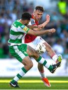 10 May 2024; Mason Melia of St Patrick's Athletic in action against Roberto Lopes of Shamrock Rovers during the SSE Airtricity Men's Premier Division match between Shamrock Rovers and St Patrick's Athletic at Tallaght Stadium in Dublin. Photo by Shauna Clinton/Sportsfile