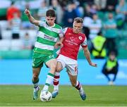 10 May 2024; Johnny Kenny of Shamrock Rovers is tackled by Jamie Lennon of St Patrick's Athletic during the SSE Airtricity Men's Premier Division match between Shamrock Rovers and St Patrick's Athletic at Tallaght Stadium in Dublin. Photo by Stephen McCarthy/Sportsfile