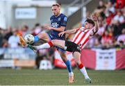 10 May 2024; Martin Miller of Bohemians in action against Adam O'Reilly of Derry City during the SSE Airtricity Men's Premier Division match between Derry City and Bohemians at The Ryan McBride Brandywell Stadium in Derry. Photo by Ramsey Cardy/Sportsfile