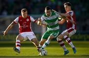 10 May 2024; Aaron Greene of Shamrock Rovers in action against Jamie Lennon, left, and Anto Breslin of St Patrick's Athletic during the SSE Airtricity Men's Premier Division match between Shamrock Rovers and St Patrick's Athletic at Tallaght Stadium in Dublin. Photo by Shauna Clinton/Sportsfile