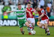 10 May 2024; Conan Noonan of Shamrock Rovers in action against Brandon Kavanagh and Aaron Bolger, right, of St Patrick's Athletic during the SSE Airtricity Men's Premier Division match between Shamrock Rovers and St Patrick's Athletic at Tallaght Stadium in Dublin. Photo by Stephen McCarthy/Sportsfile