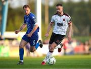10 May 2024; Robbie Benson of Dundalk in action against Rowan McDonald of Waterford during the SSE Airtricity Men's Premier Division match between Waterford and Dundalk at the Regional Sports Centre in Waterford. Photo by Michael P Ryan/Sportsfile