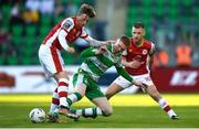 10 May 2024; Chris Forrester of St Patrick's Athletic is tackled by Darragh Nugent of Shamrock Rovers during the SSE Airtricity Men's Premier Division match between Shamrock Rovers and St Patrick's Athletic at Tallaght Stadium in Dublin. Photo by Shauna Clinton/Sportsfile