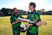 10 May 2024; Gareth Delany of Ireland, right, and teammate Paul Stirling after match one of the Floki Men's T20 International Series between Ireland and Pakistan at Castle Avenue Cricket Ground in Dublin. Photo by Seb Daly/Sportsfile