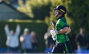 10 May 2024; Curtis Campher of Ireland after hitting the winning runs during match one of the Floki Men's T20 International Series between Ireland and Pakistan at Castle Avenue Cricket Ground in Dublin. Photo by Seb Daly/Sportsfile