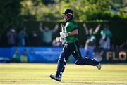 10 May 2024; Curtis Campher of Ireland after hitting the winning runs during match one of the Floki Men's T20 International Series between Ireland and Pakistan at Castle Avenue Cricket Ground in Dublin. Photo by Seb Daly/Sportsfile
