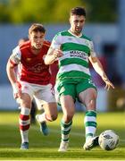 10 May 2024; Neil Farrugia of Shamrock Rovers in action against Anto Breslin of St Patrick's Athletic during the SSE Airtricity Men's Premier Division match between Shamrock Rovers and St Patrick's Athletic at Tallaght Stadium in Dublin. Photo by Shauna Clinton/Sportsfile