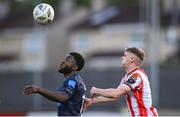 10 May 2024; James Akintunde of Bohemians in action against Ronan Boyce of Derry City during the SSE Airtricity Men's Premier Division match between Derry City and Bohemians at The Ryan McBride Brandywell Stadium in Derry. Photo by Ramsey Cardy/Sportsfile