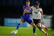 10 May 2024; Eoin Kenny of Dundalk in action against Kacper Radkowski of Waterford during the SSE Airtricity Men's Premier Division match between Waterford and Dundalk at the Regional Sports Centre in Waterford. Photo by Michael P Ryan/Sportsfile