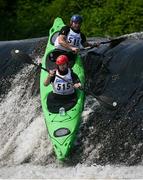 11 May 2024; Actor Jack Reynor, front, and Paul Ashmore navigate Lucan Weir whilst competing in the Touring Double T2 Class during The 63rd International Liffey Descent at Lucan Weir in Lucan, Dublin. Photo by Seb Daly/Sportsfile