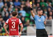 10 May 2024; Anto Breslin of St Patrick's Athletic is shown a yellow card by referee Paul McLaughlin during the SSE Airtricity Men's Premier Division match between Shamrock Rovers and St Patrick's Athletic at Tallaght Stadium in Dublin. Photo by Stephen McCarthy/Sportsfile