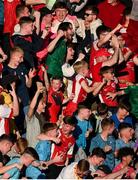 10 May 2024; St Patrick's Athletic supporters celebrate their side's opening goal during the SSE Airtricity Men's Premier Division match between Shamrock Rovers and St Patrick's Athletic at Tallaght Stadium in Dublin. Photo by Stephen McCarthy/Sportsfile