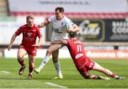 11 May 2024; Jacob Stockdale of Ulster is tackled by Ryan Conbeer and Sam Costelow of Scarlets during the United Rugby Championship match between Scarlets and Ulster at Parc Y Scarlets in Llanelli, Wales. Photo by Chris Fairweather/Sportsfile