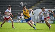 11 May 2024; Conor Ryan of Roscommon in action against Ódhrán Brolly, left, and Gavin Potter of Tyrone during the EirGrid GAA All-Ireland Football U20 Championship semi-final match between Roscommon and Tyrone at Kingspan Breffni in Cavan. Photo by Sam Barnes/Sportsfile