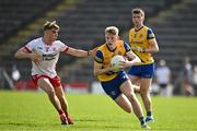 11 May 2024; Robert Heneghan of Roscommon in action against Conor O'Neill of Tyrone during the EirGrid GAA All-Ireland Football U20 Championship semi-final match between Roscommon and Tyrone at Kingspan Breffni in Cavan. Photo by Sam Barnes/Sportsfile